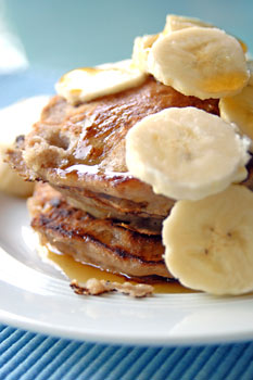 Banana walnut pancakes with maple syrup