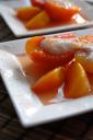 Wine simmered peaches with wine flavored yogurt