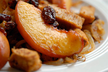 Tofu pieces with caramelized onions and peaches