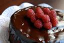 Chocolate whiskey cake with raspberries