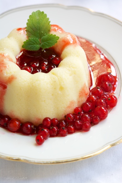 Vegan Semolina Pudding with Red Currant Sauce - Click here to license this image from Stocksy