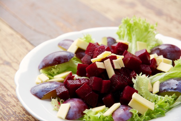 Beet and Plum Salad with Vegan Cheese - Click here to license this image