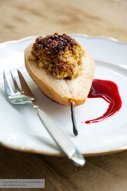 Nut Filled Pears with Elderberry Sauce - Click here to license this image from Stocksy
